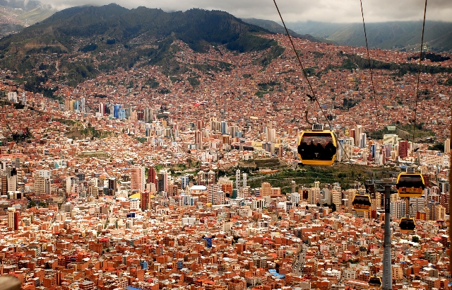 four running cable cars during daytime_副本